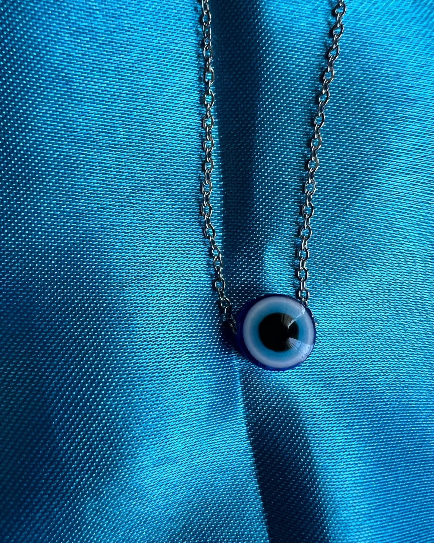 silver blue ojo necklace