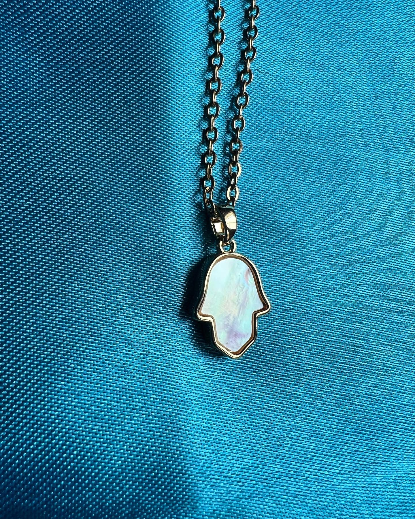 Pearl hamsa hand necklace