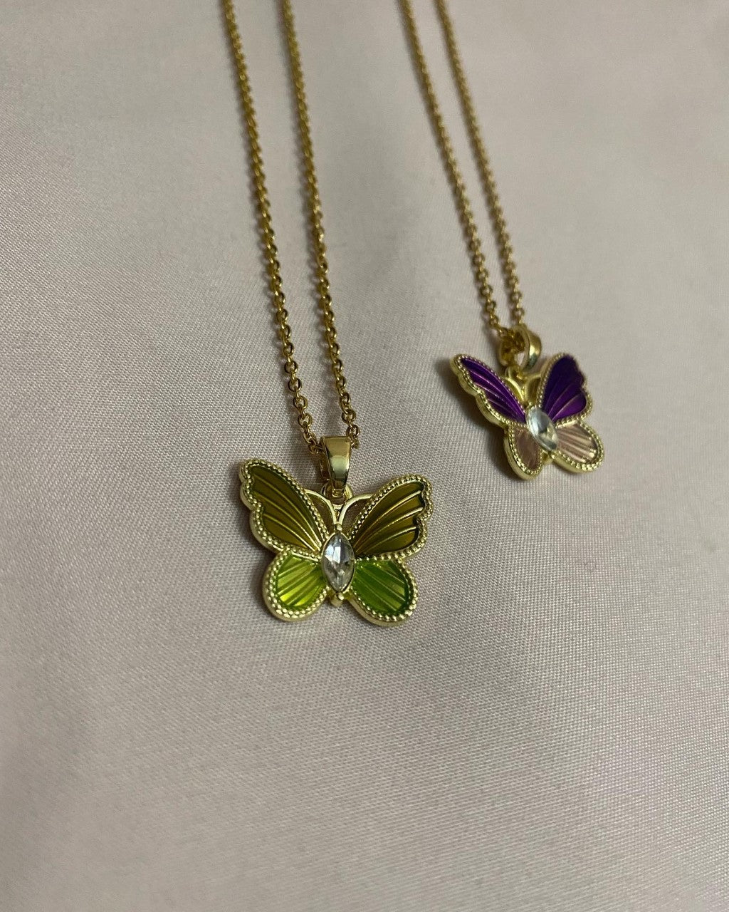 green & purple mariposa necklaces