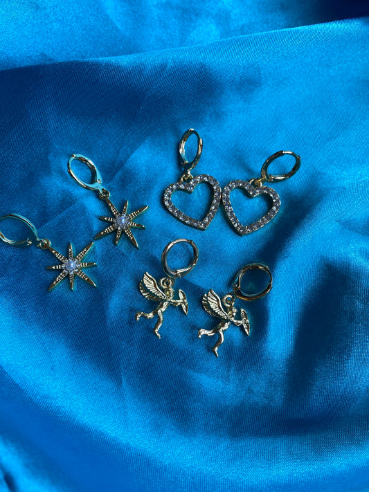 Star, heart, and angel earrings