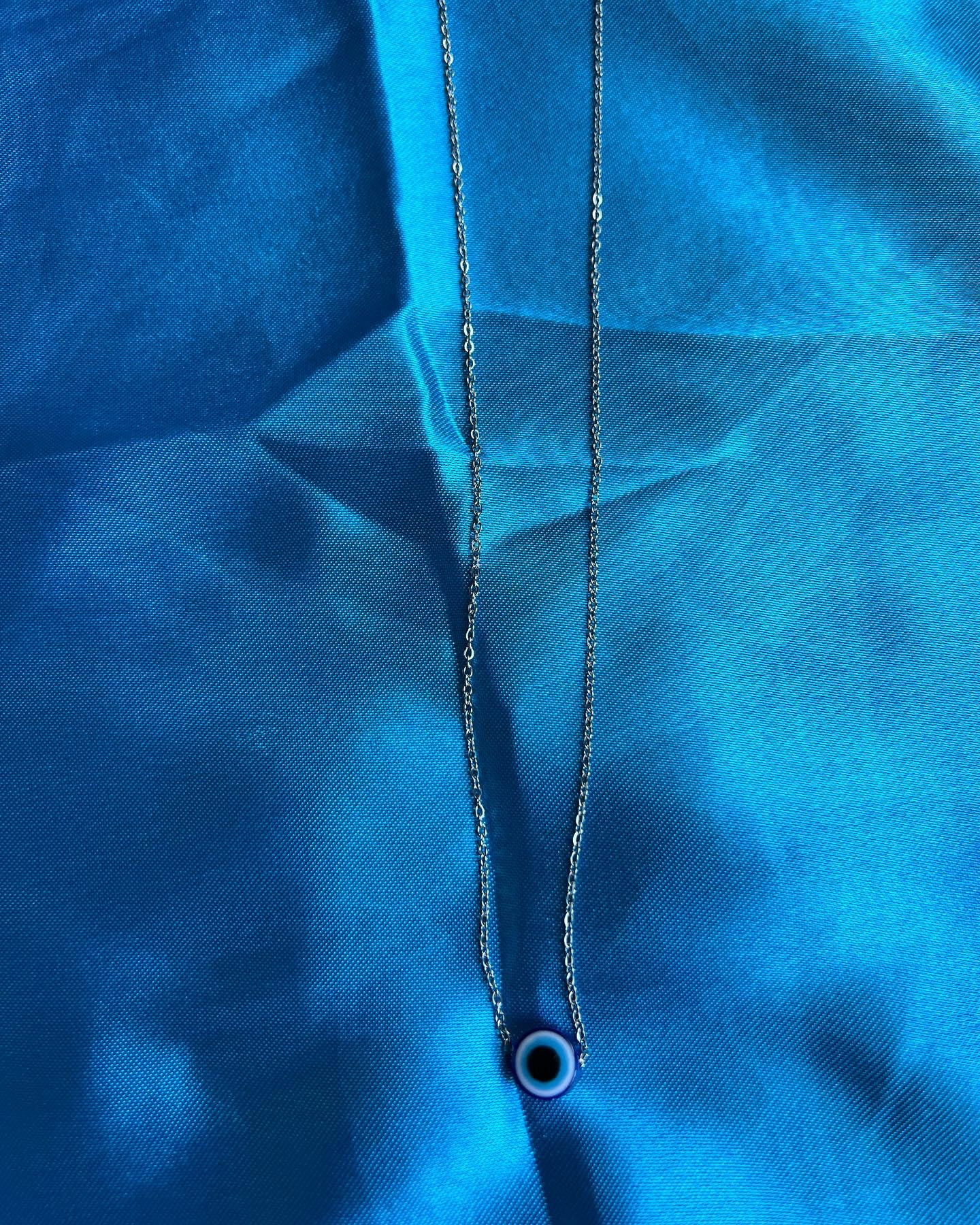 silver blue ojo necklace