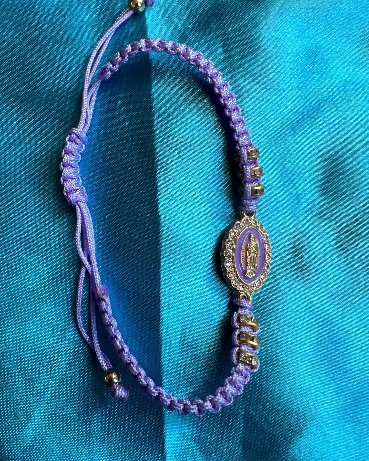 purple & white Virgin Mary bracelets