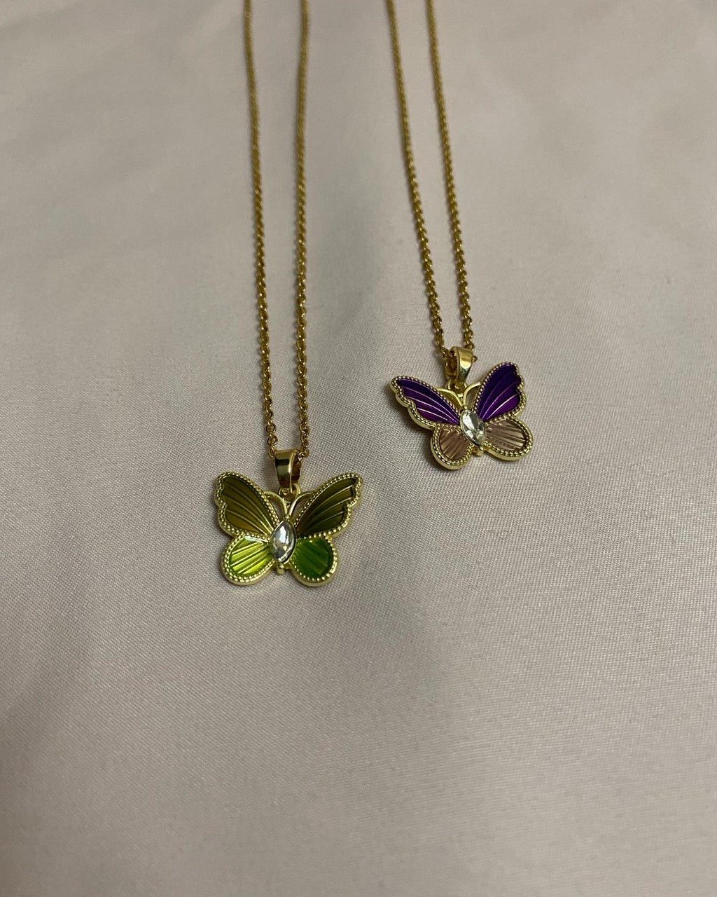 green & purple mariposa necklaces